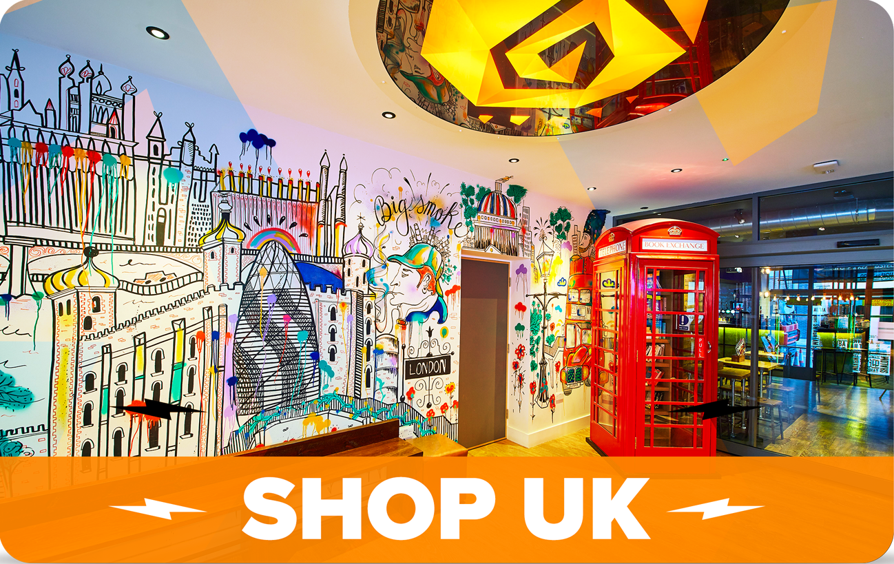 London hostel foyer with colourful wall art; text 'SHOP UK'