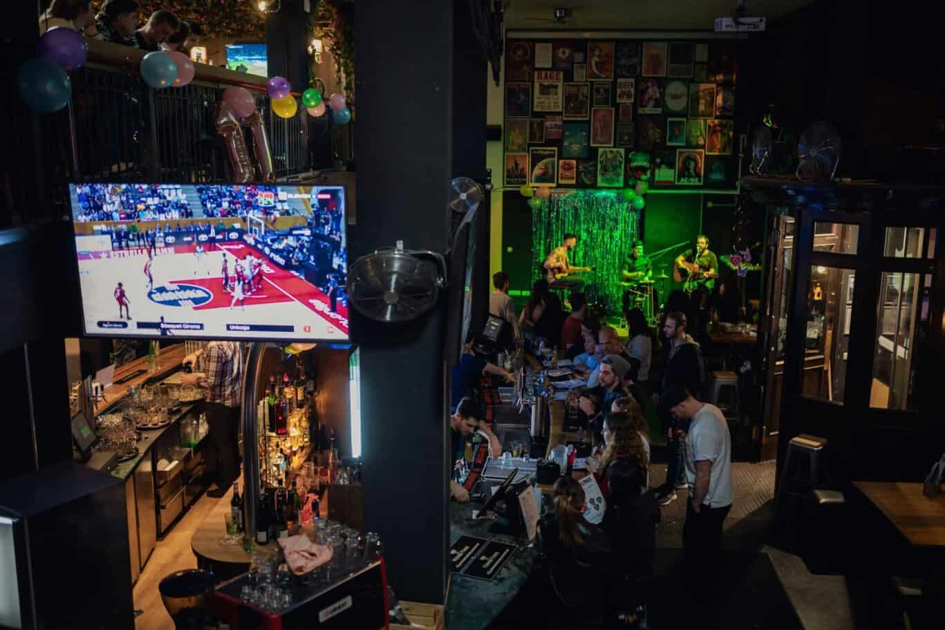 Interior view of the lively bar and lounge area at St Christopher’s Hostel, Alexanderplatz, Berlin.