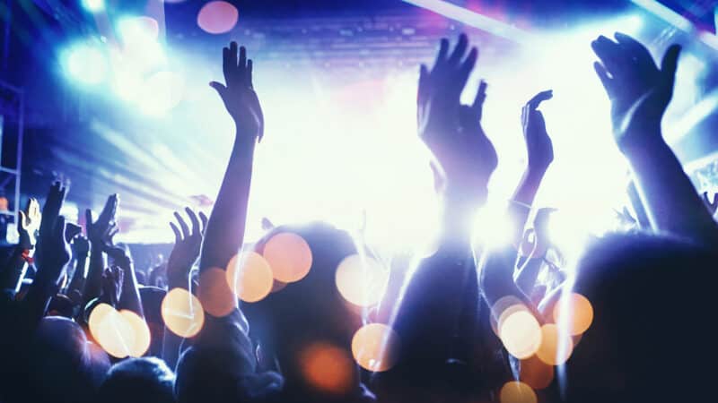 Nightclub scene at St Christopher’s Berlin - Mitte with lively crowd and vibrant lighting.