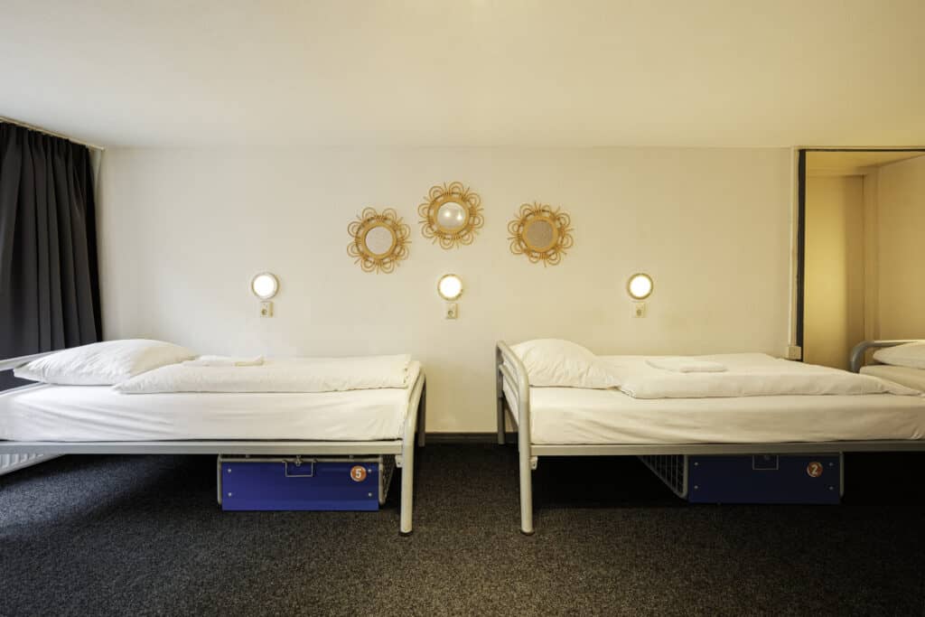 5 Bed Female Dorm – 4 (with bed numbers)