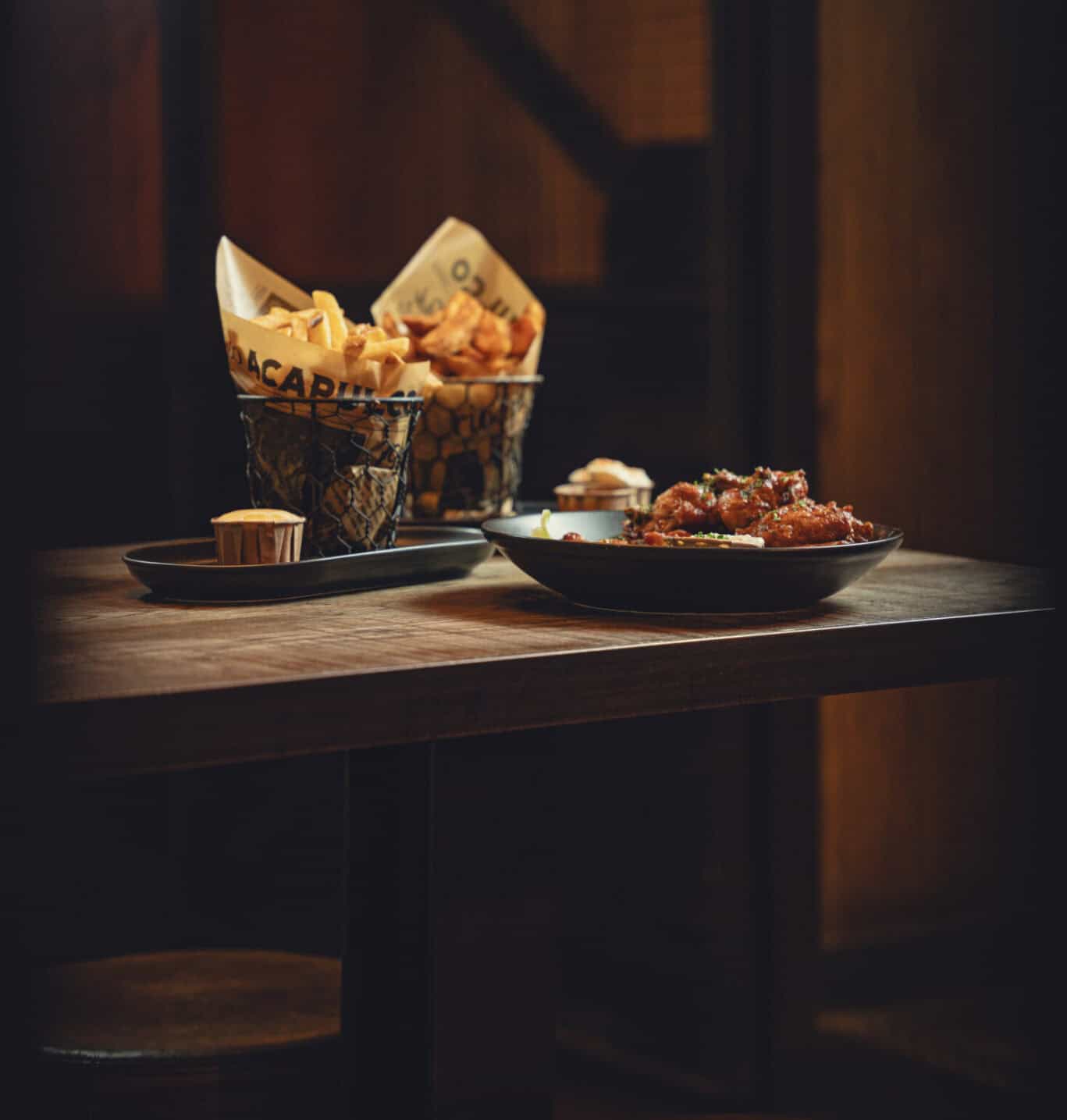 Delicious snacks and fried food served at Winston Hostel in Amsterdam.