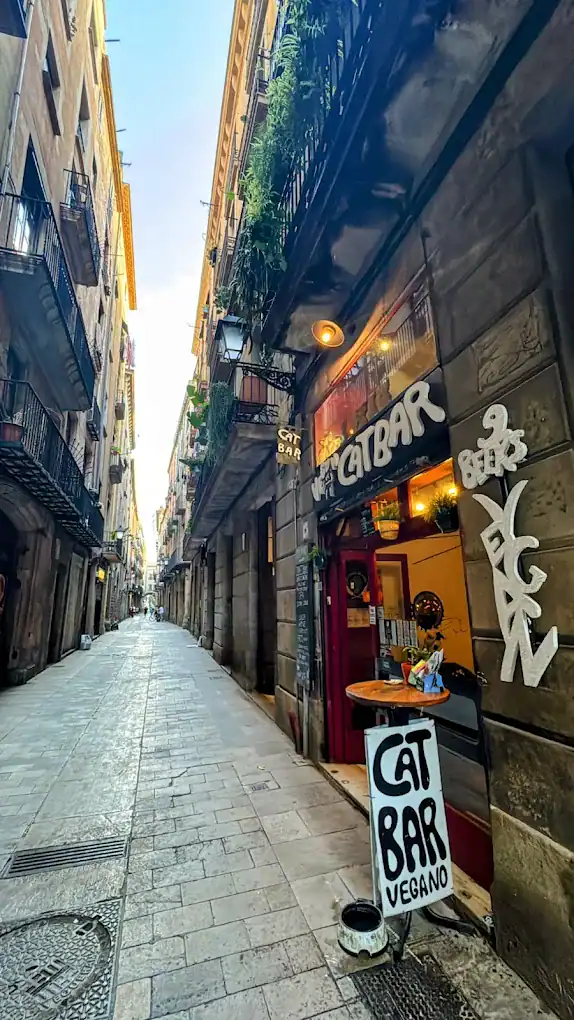 Vibrant street view of St Christopher’s Barcelona hostel on Las Ramblas with colourful signage and o.