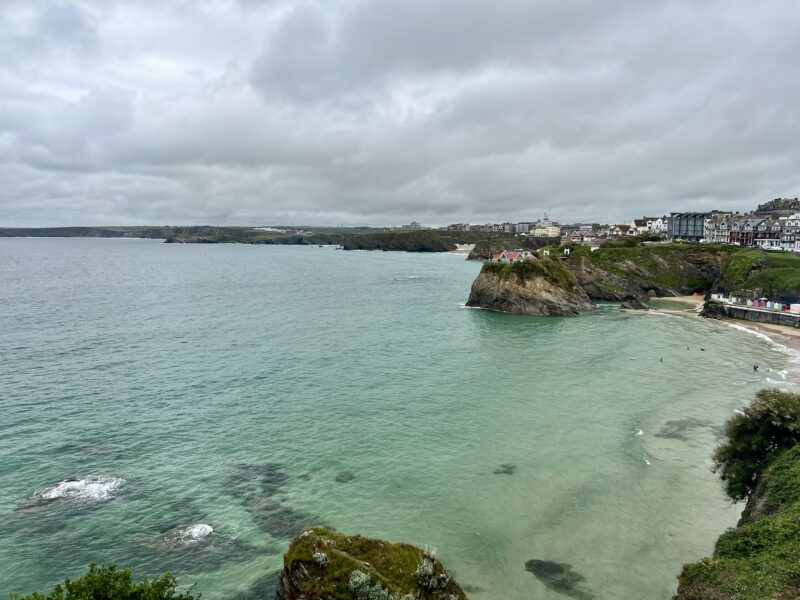 A scenic coastal view from a hostel overlooking the sea and cliffs.