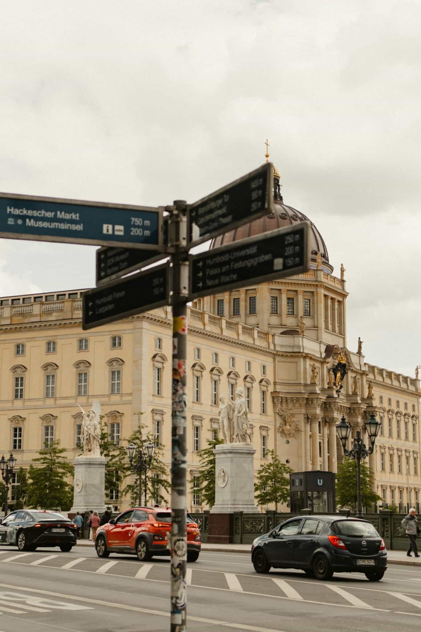 Street scene in Berlin Mitte with historic buildings and traffic.