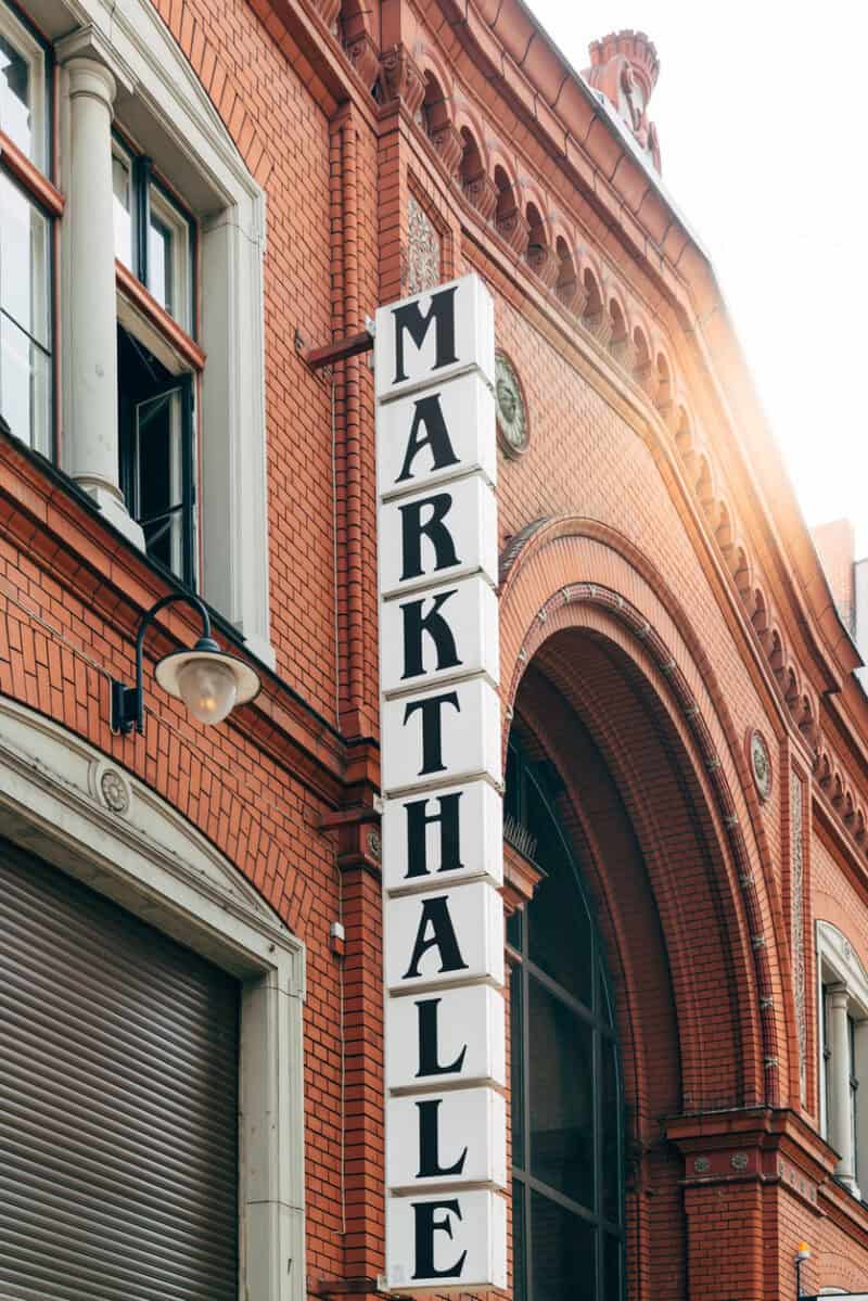 Iconic red brick building with large 