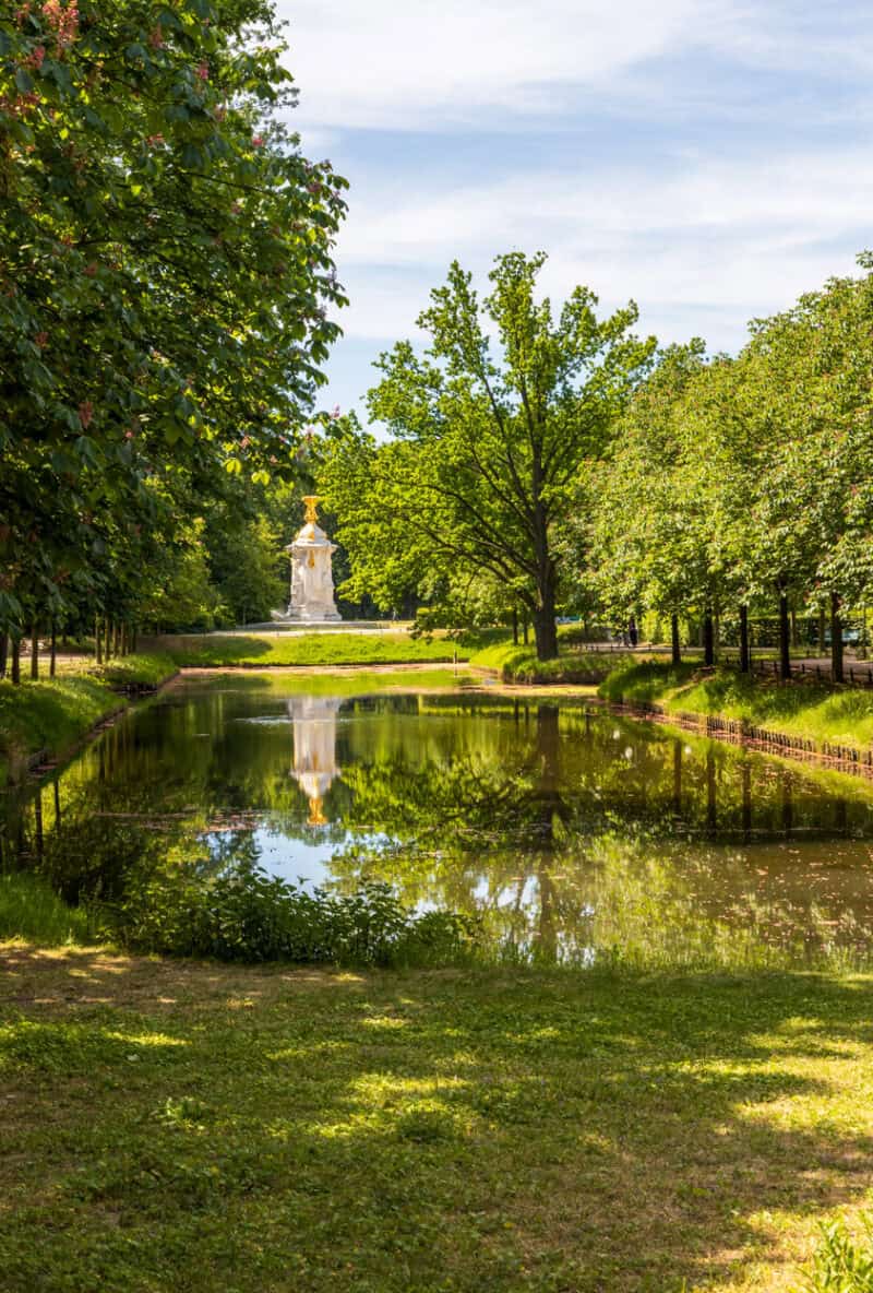 Park with pond and statue in Berlin Mitte.