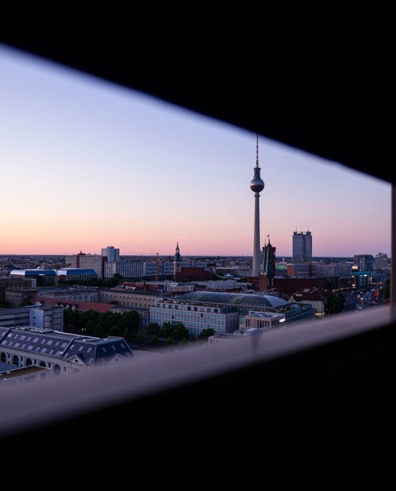 City view from St Christopher's Berlin - Mitte hostel showing Berlin TV Tower at sunset.