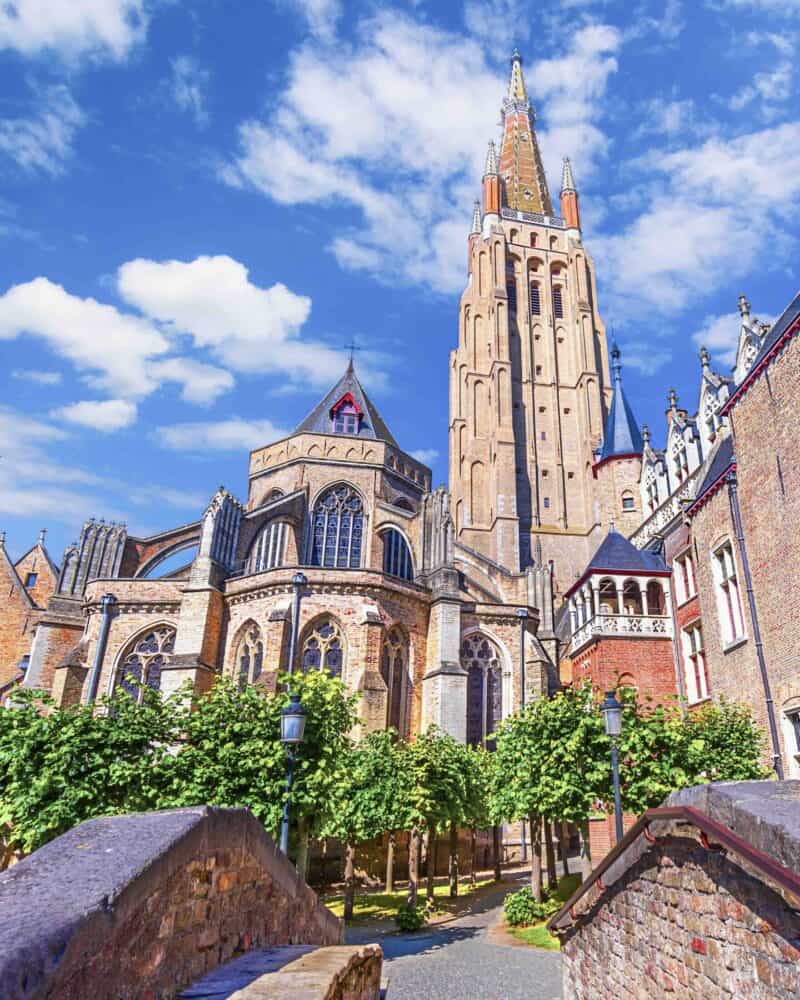 Bruges, Belgium: Church of Our Lady (Vrouwekerk) and Bonifacius Bridge in a beautifull, sunny day, West Flanders