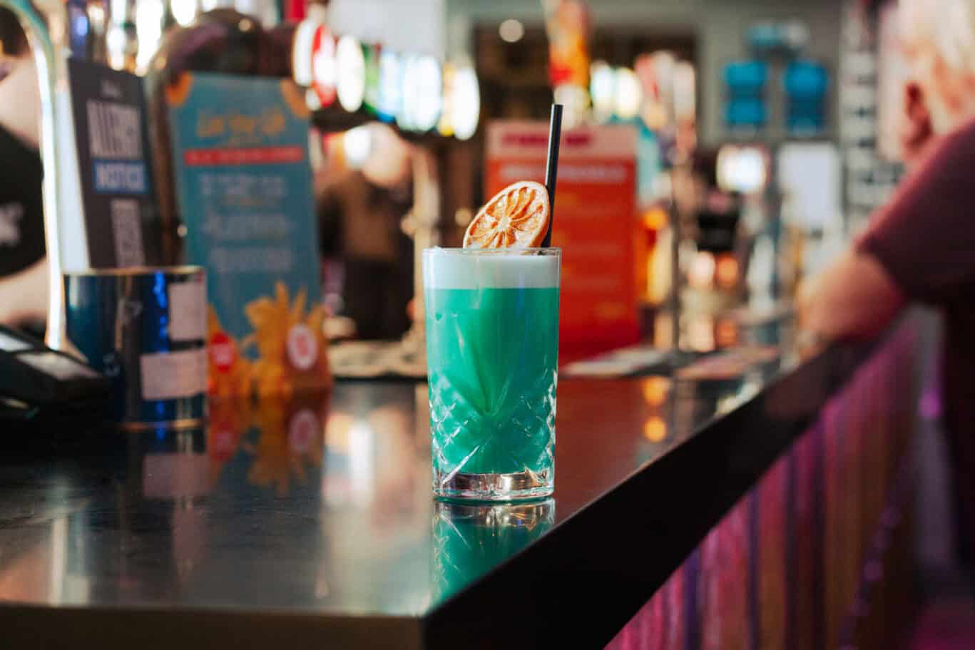 Colourful cocktail on bar counter in Edinburgh.