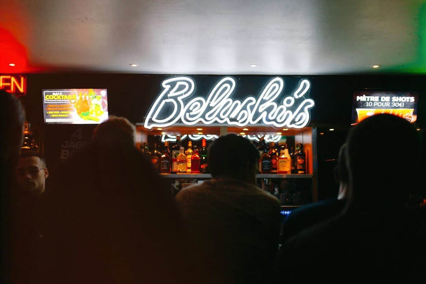 Interior of Belushi's bar at St Christopher’s Paris - Canal hostel, lively nightlife scene.