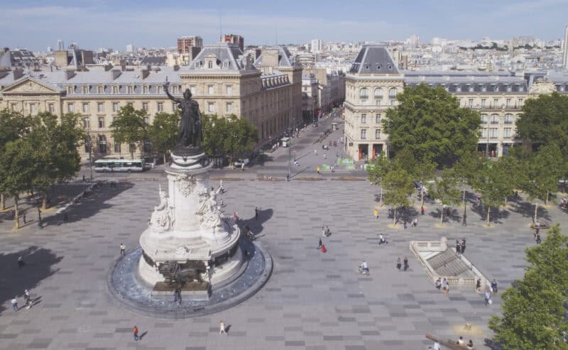 View of Paris city square near St Christopher's Paris - Canal hostel, with historic buildings and a.