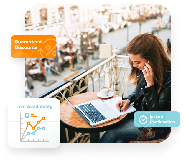 woman working on laptop from city balcony