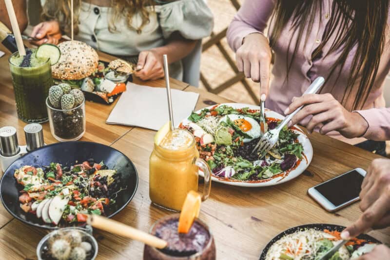 Modern hostel dining with fresh salads and smoothies at St Christopher’s Berlin - Mitte.