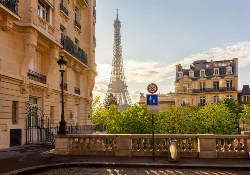 Eiffel tower at sunrise seen from avenue de Camoens, Paris, France