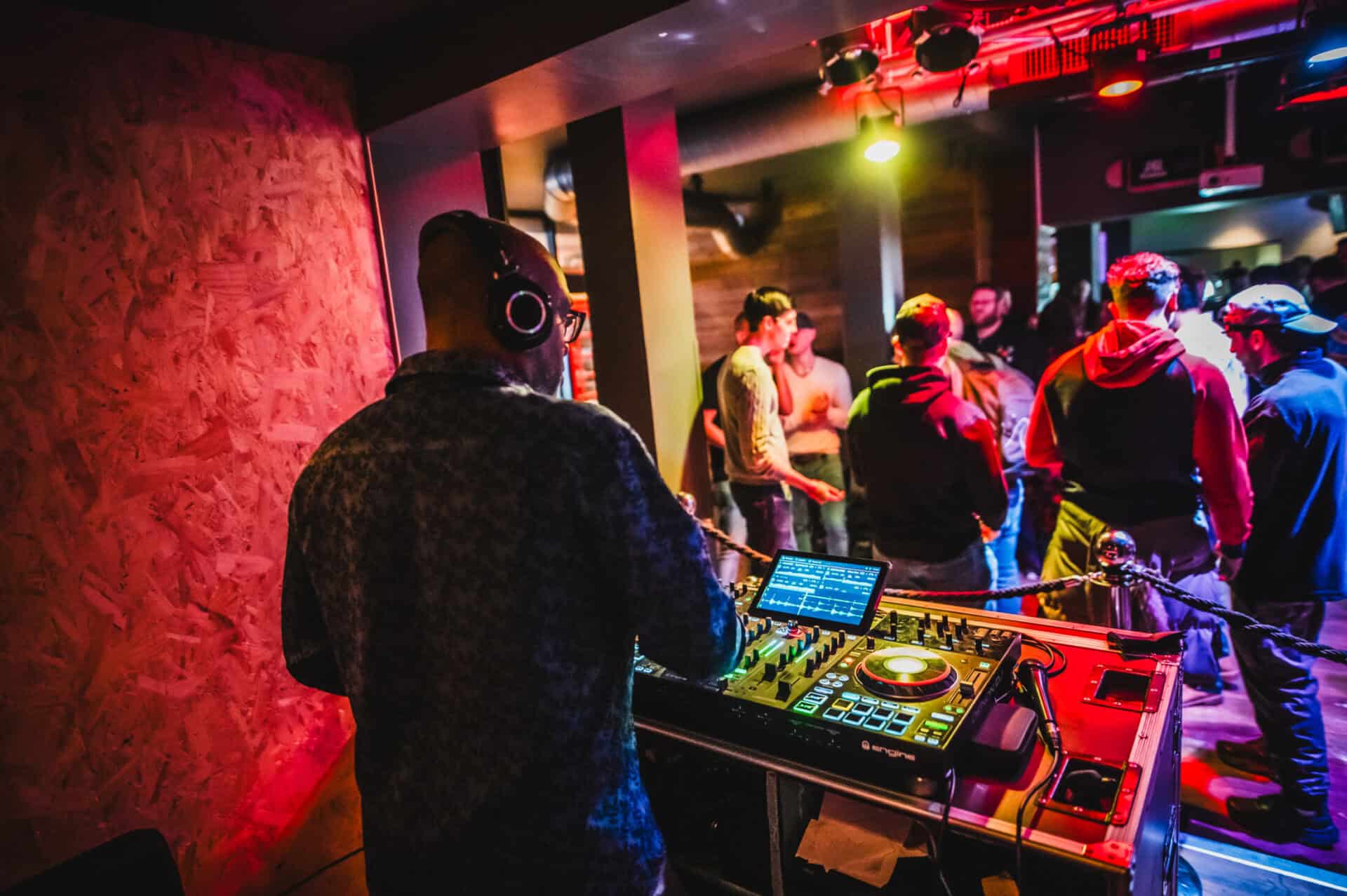 DJ playing music at St Christopher's nightclub in a lively setting.